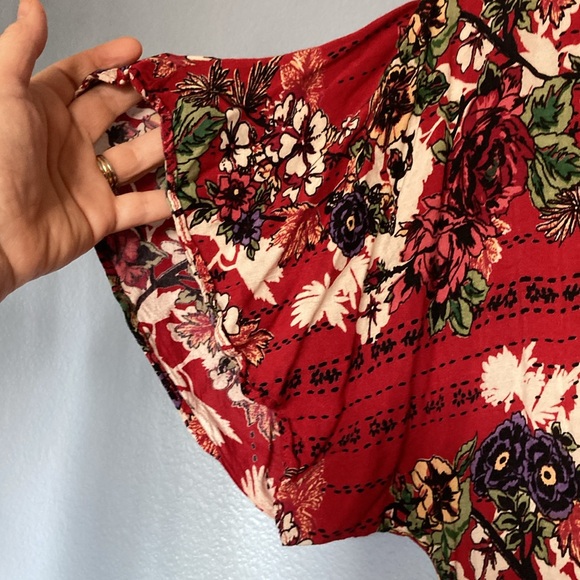 ANGIE Wide Leg bohemian floral jumpsuit with flirty peak a boo twist tie on top - Picture 3 of 13